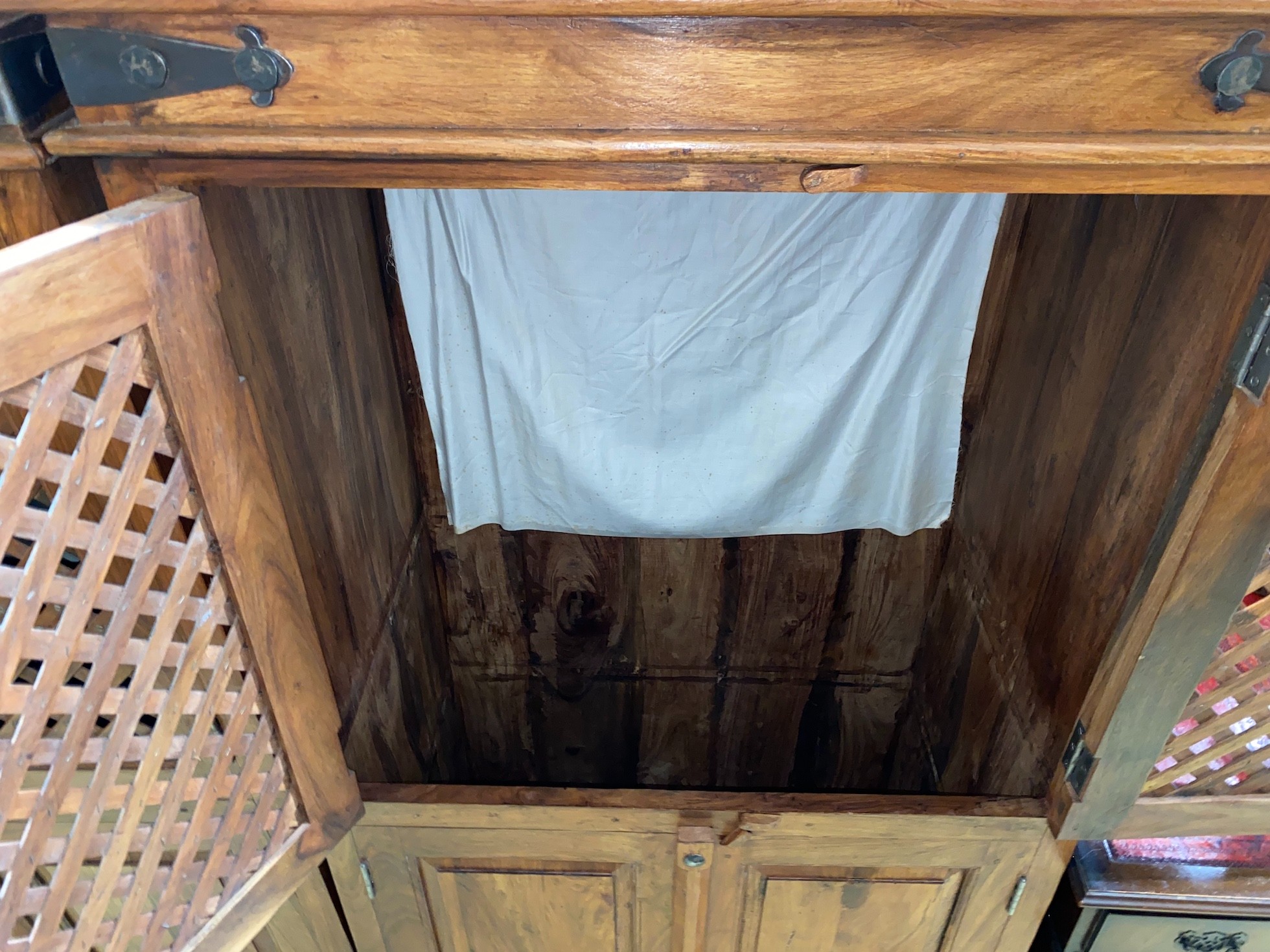 A pair of Indonesian metal mounted hardwood wardrobes, width 85cm, depth 55cm, height 161cm